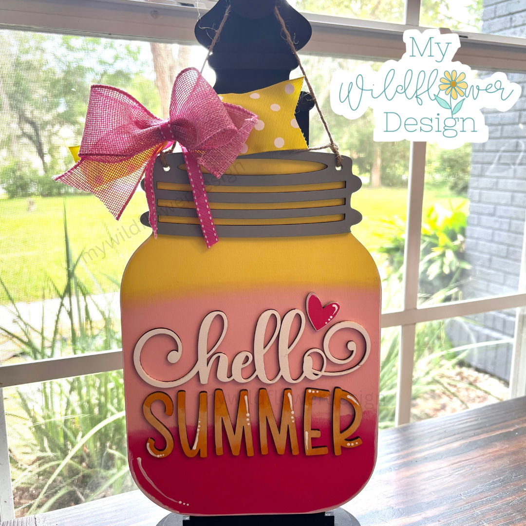 Decorative sign with 'Hello Summer' text and a pink bow, featuring 'My Wildflower Design' branding.